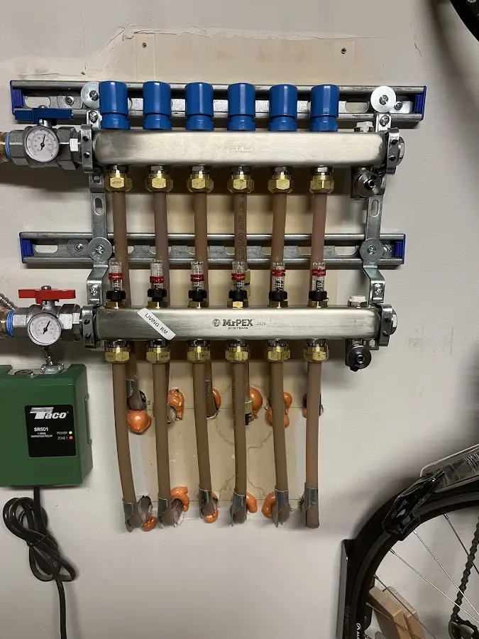 Plumber performing Water Heater Repair at a residential property in Peru